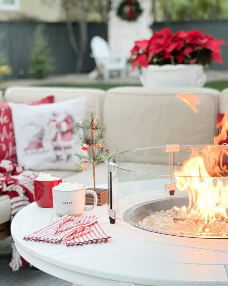 Red and White Patio With Glass Firepit