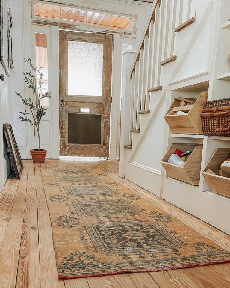 Rustic Entryway With Staircase Storage