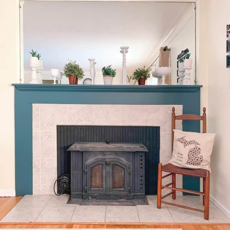 Rustic Metal Fireplace With Teal Green Accents