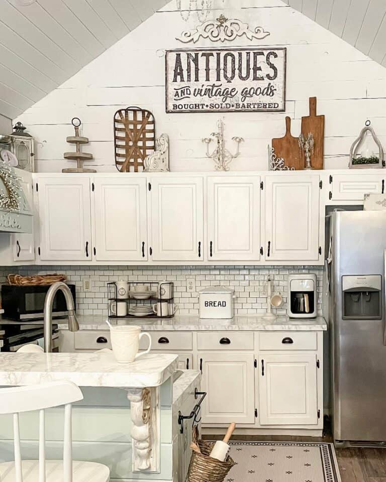 Rustic White Kitchen With Vaulted Shiplap Ceiling