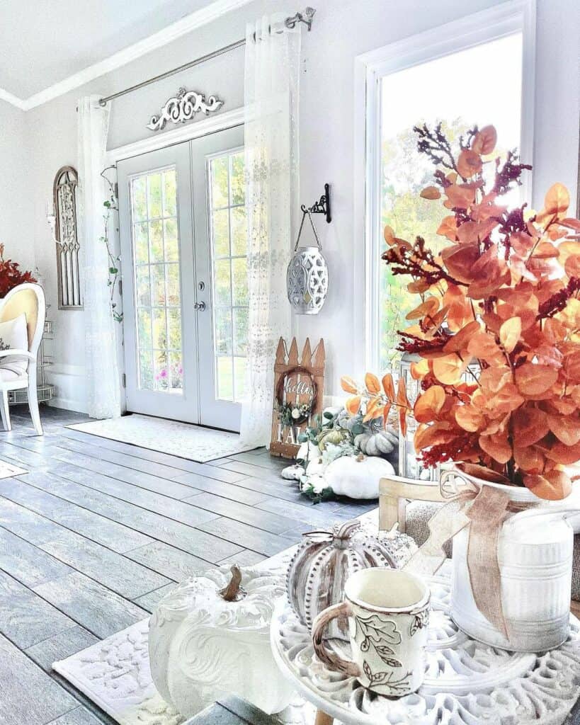 Sheer White Curtains Over Large Glass Doors