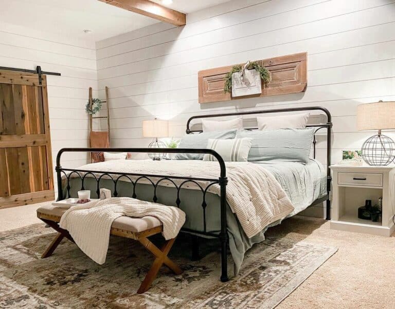 Shiplap Wall With Metal Bedframe and Sliding Barndoor