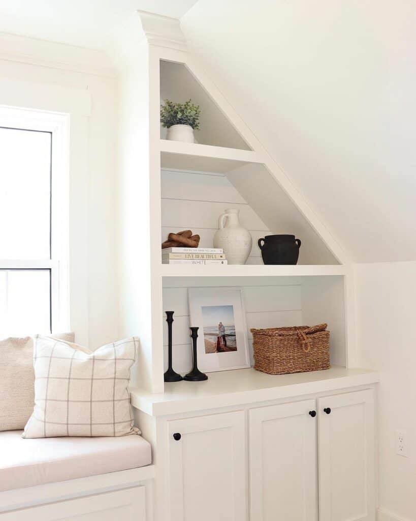 Slanted Ceiling Creates Asymmetrical Shelves