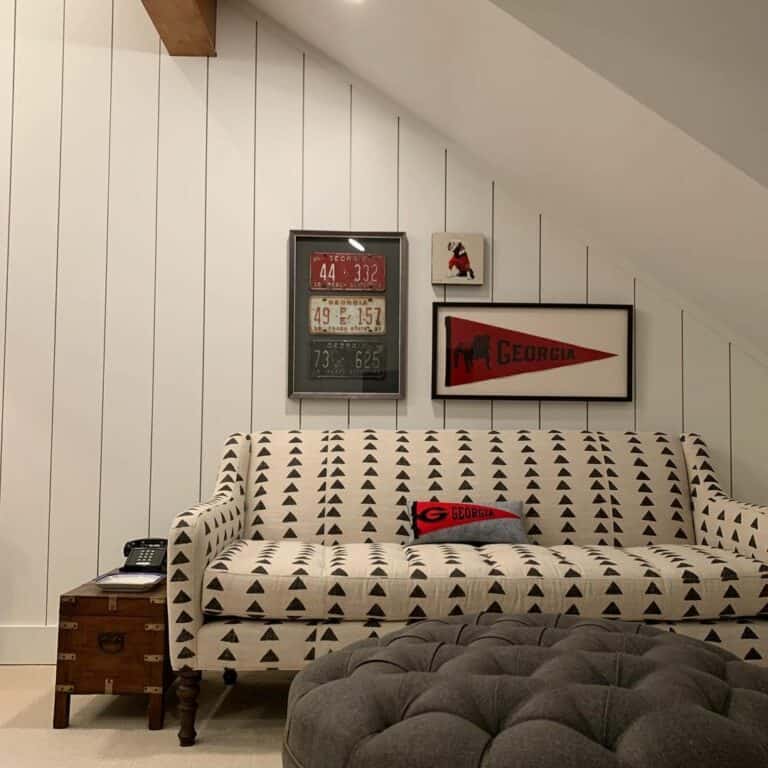Small Seating Area With Sports Wall Décor