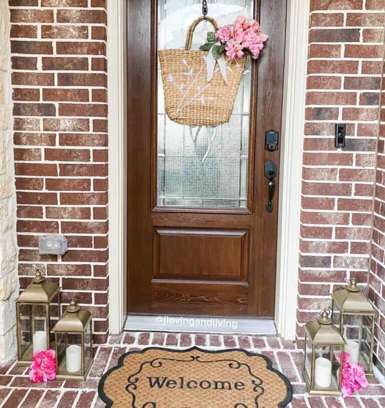Stained Wood Porch Door With Hanging Basket Décor