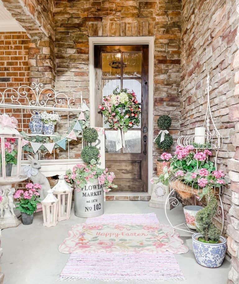 Stone Front Porch With Pink Flower Spring Décor