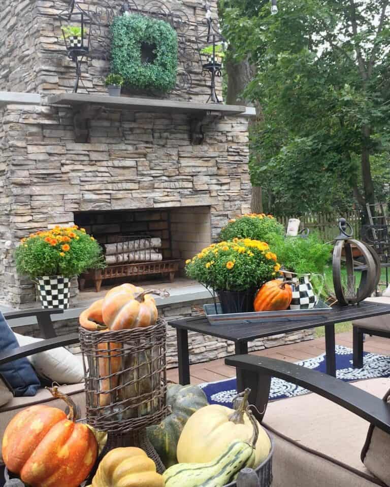 Stone Patio Fireplace Décor With Harvest Accents