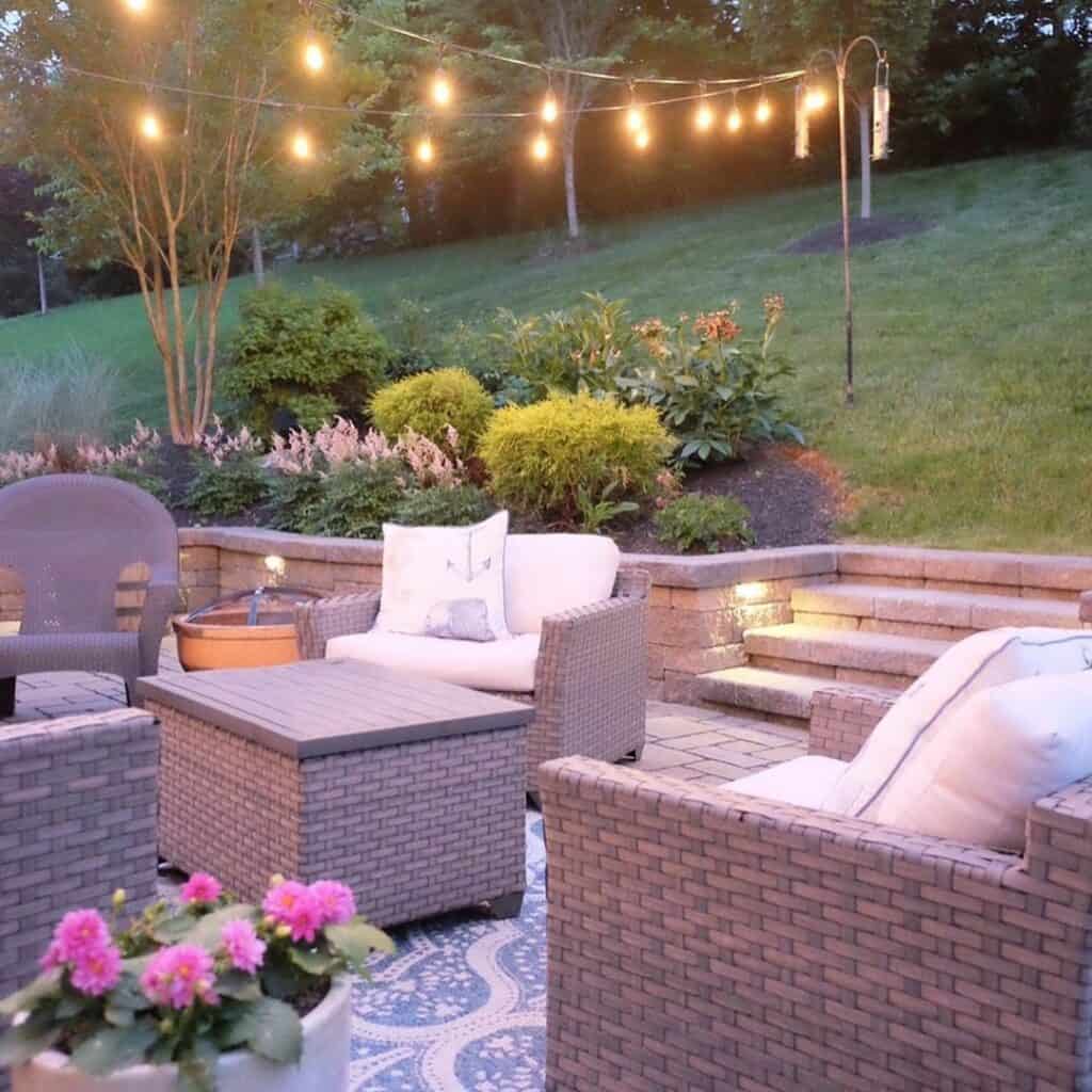 String Lights Above Wicker Patio Furniture