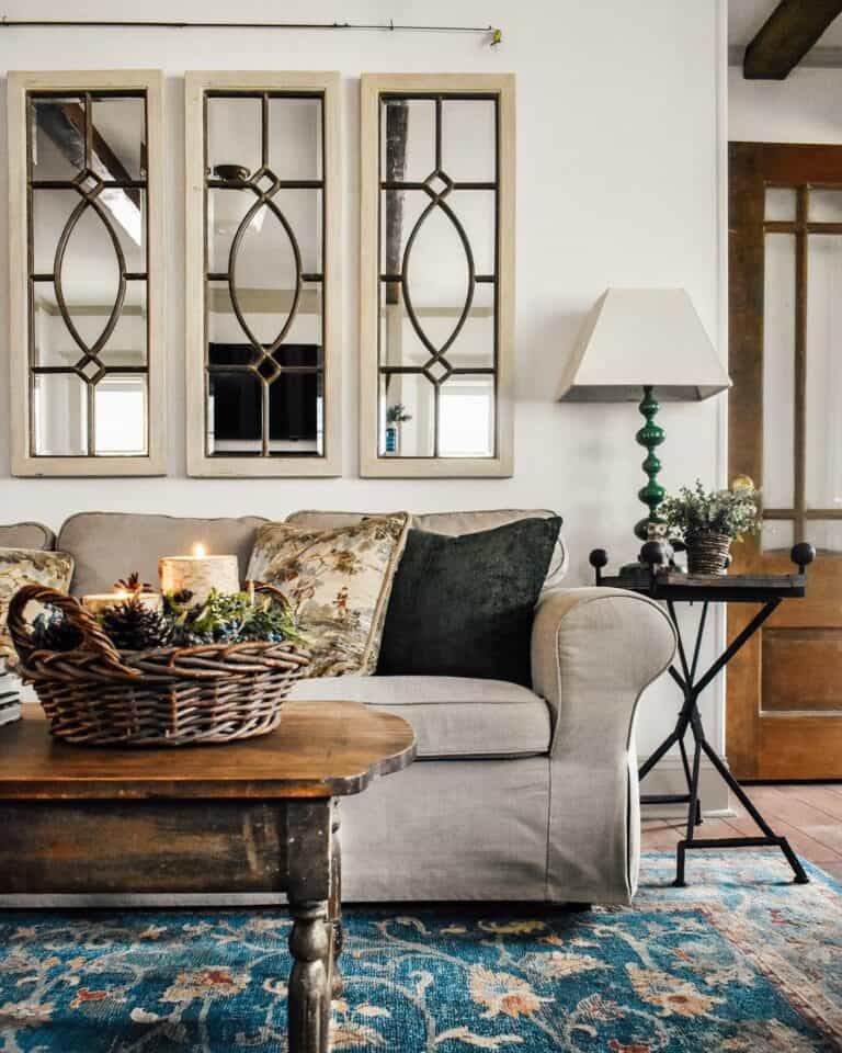 Three Matching Rectangular Mirrors Over Couch