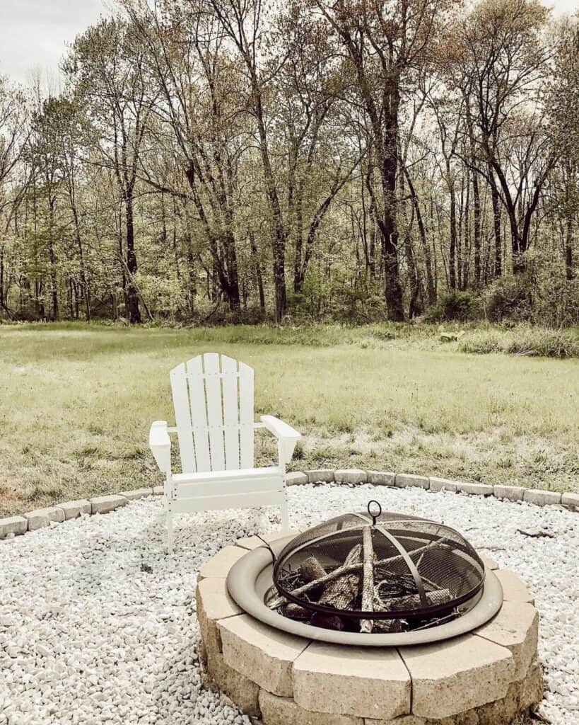 Tranquil Backyard Patio With Stone Firepit