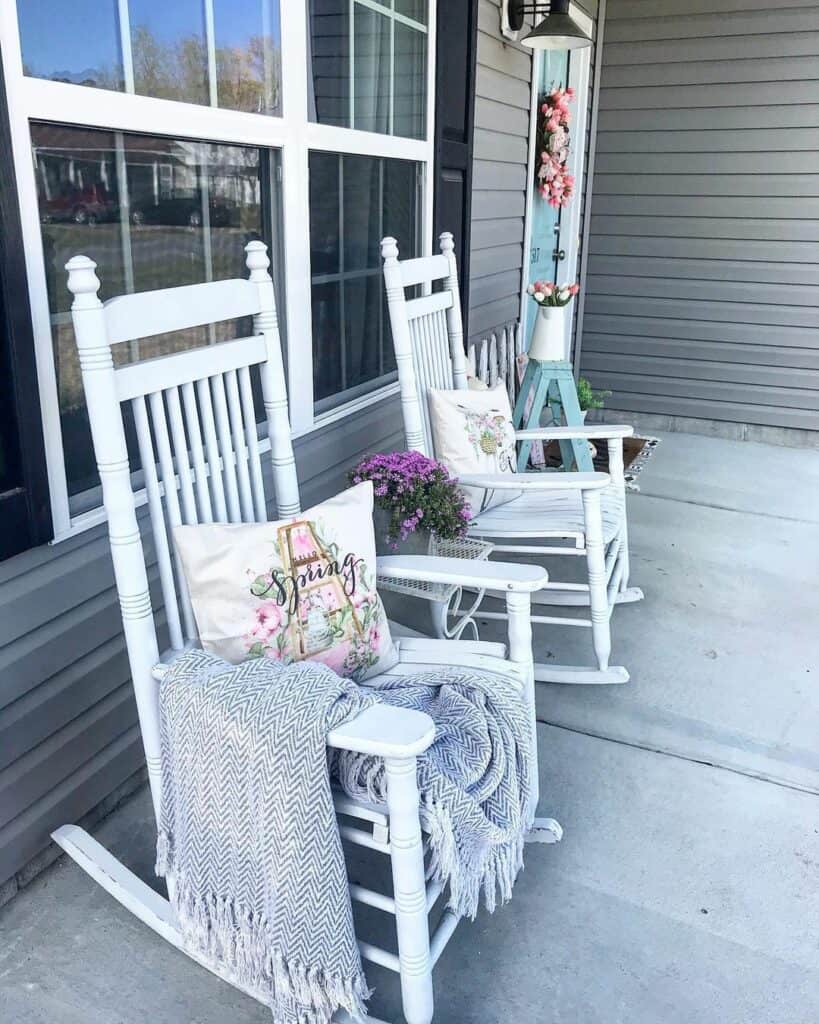 Two White Rocking Chairs on a Front Porch