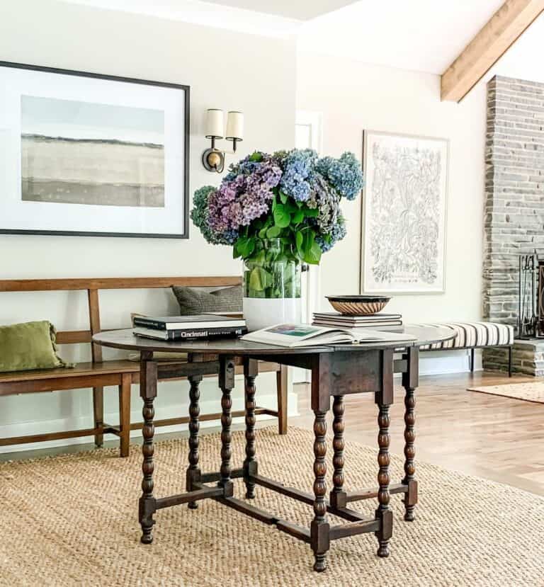 Vase of Flowers on Large Wooden Table