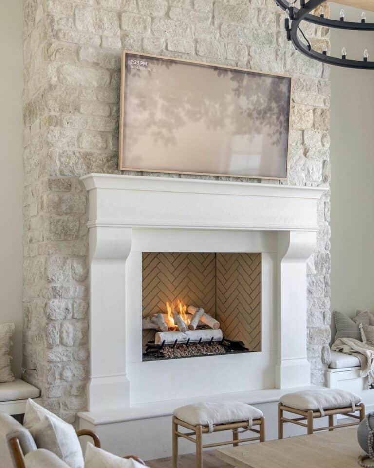 Vintage White Brick Fireplace With Mounted TV