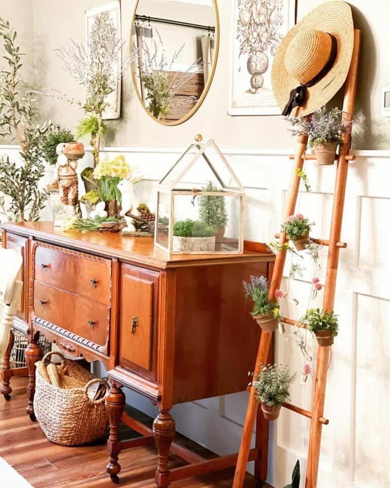 Vintage Wooden Sideboard Topped With Greenery