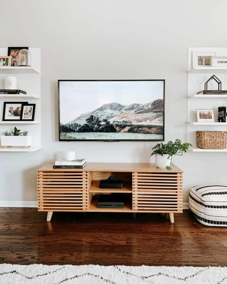 Wallmounted TV Flanked With White Floating Shelving Soul & Lane