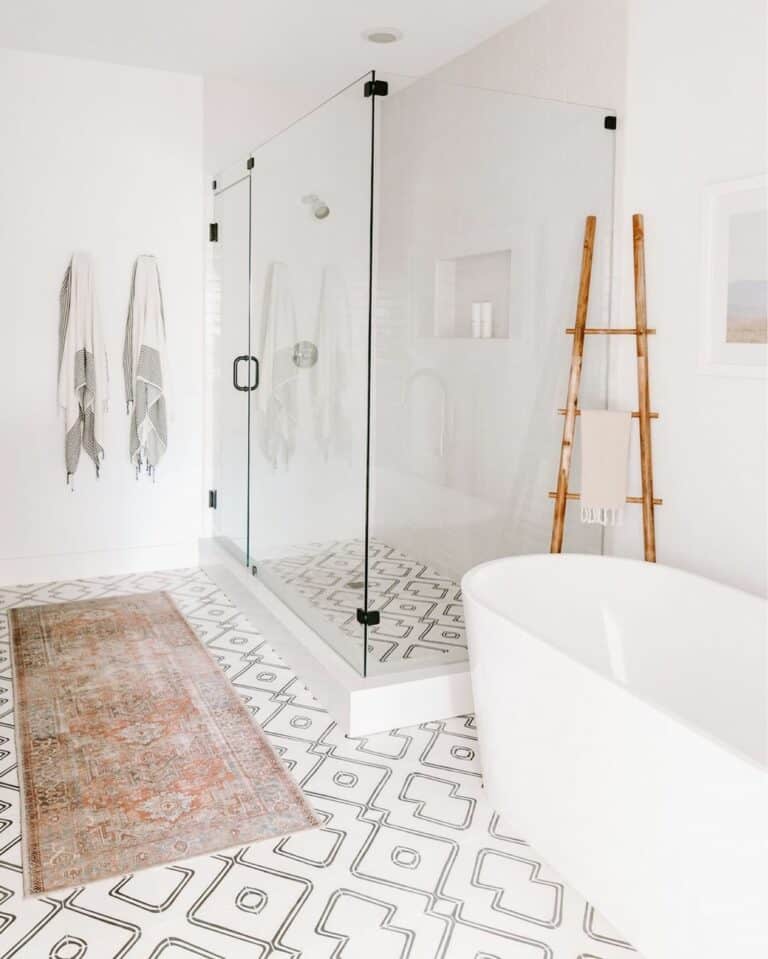 White Bathroom With Frameless Shower Doors