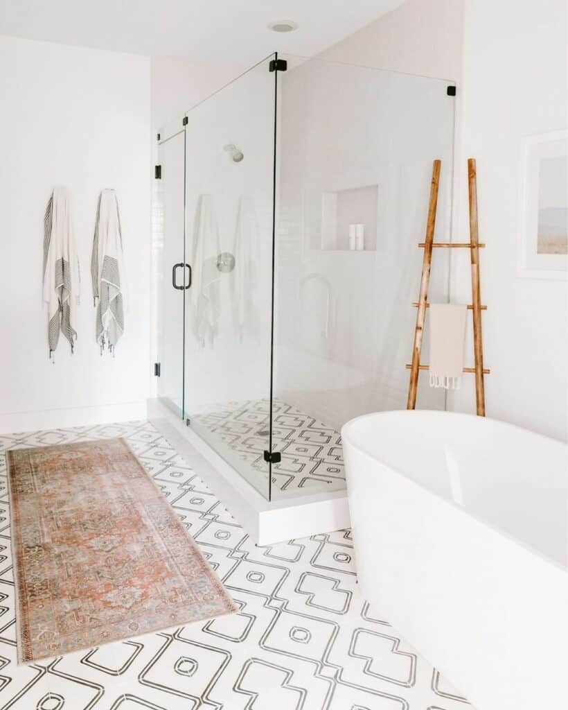 White Bathroom With Frameless Shower Doors