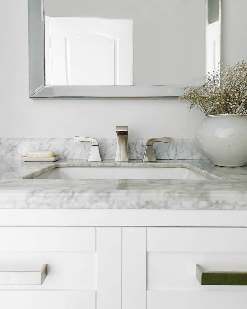 White Bathroom With Gray Marble Countertop