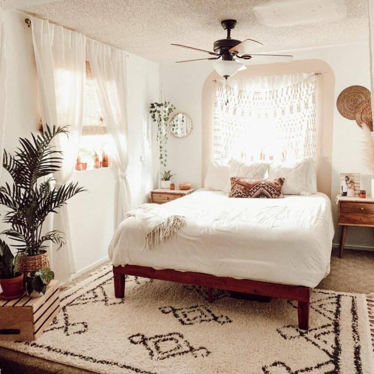 White Bedroom With Tasseled Rug
