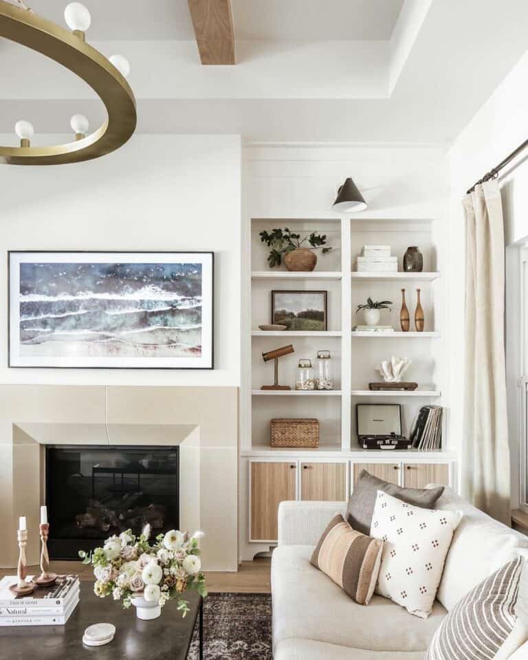 White Built-in Shelves With Fluted Cabinets