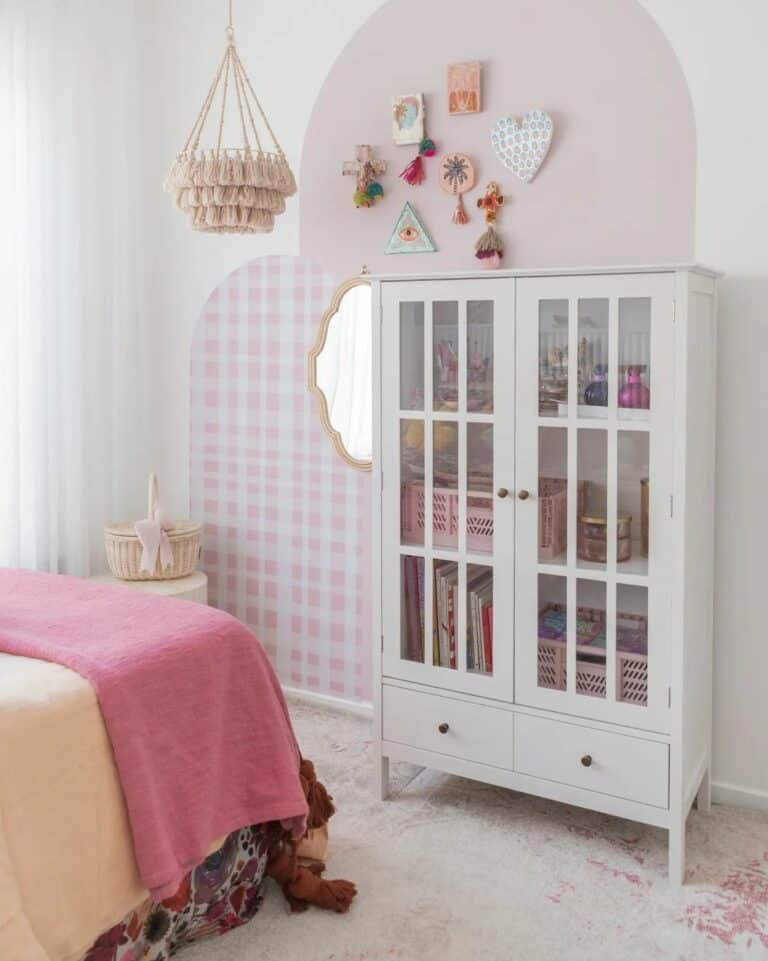 White Cabinet Against Pink and White Wall