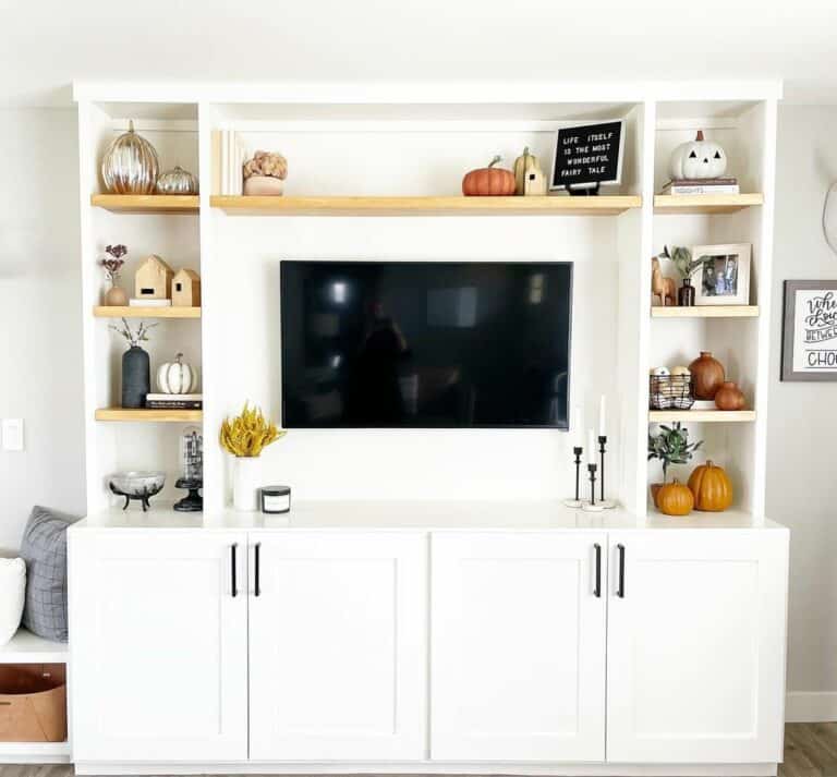 White Entertainment Center With Light Wood Floating Shelves