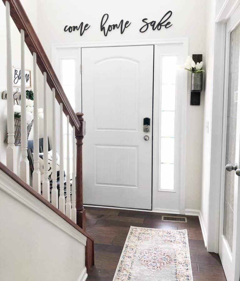 White Entrance Door With Black Wall Letters