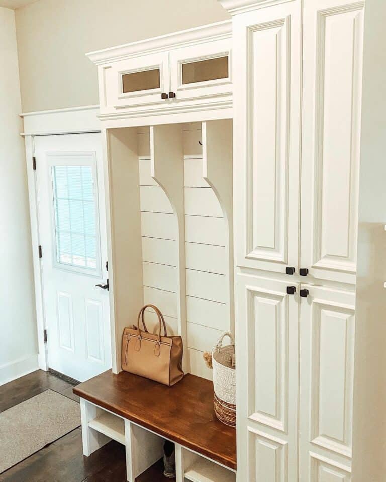 White Entryway Mudroom Locker With Stained Wood Bench