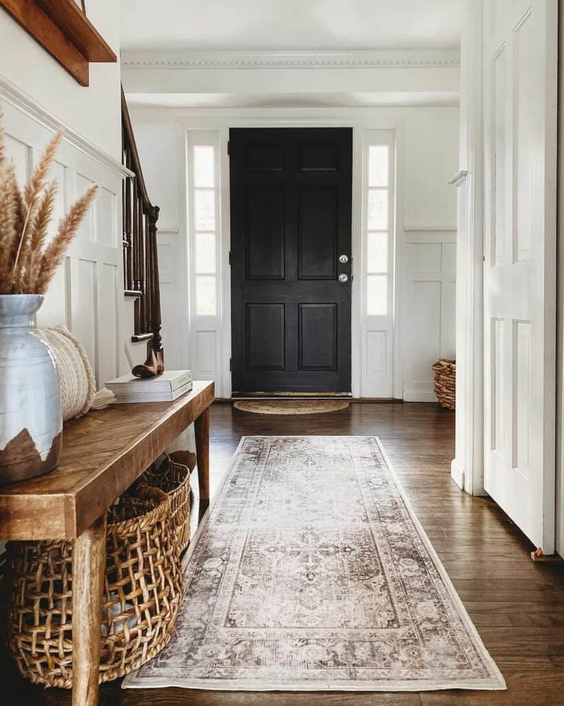 White Entryway With a Black Door