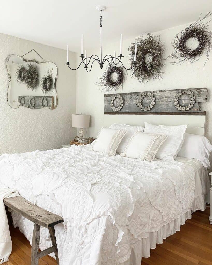 White Farmhouse Bedroom With Grapevine Wreaths