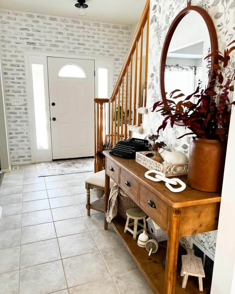 White Farmhouse Foyer With Brick Accent Wall