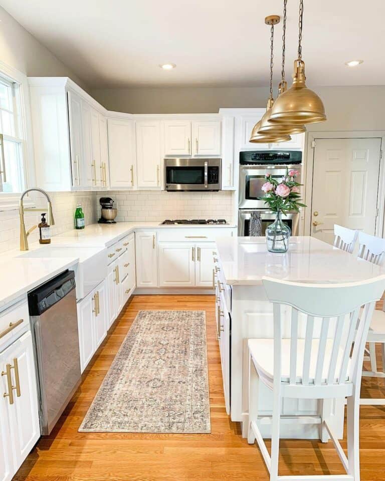 White Farmhouse Kitchen With Gold Accents