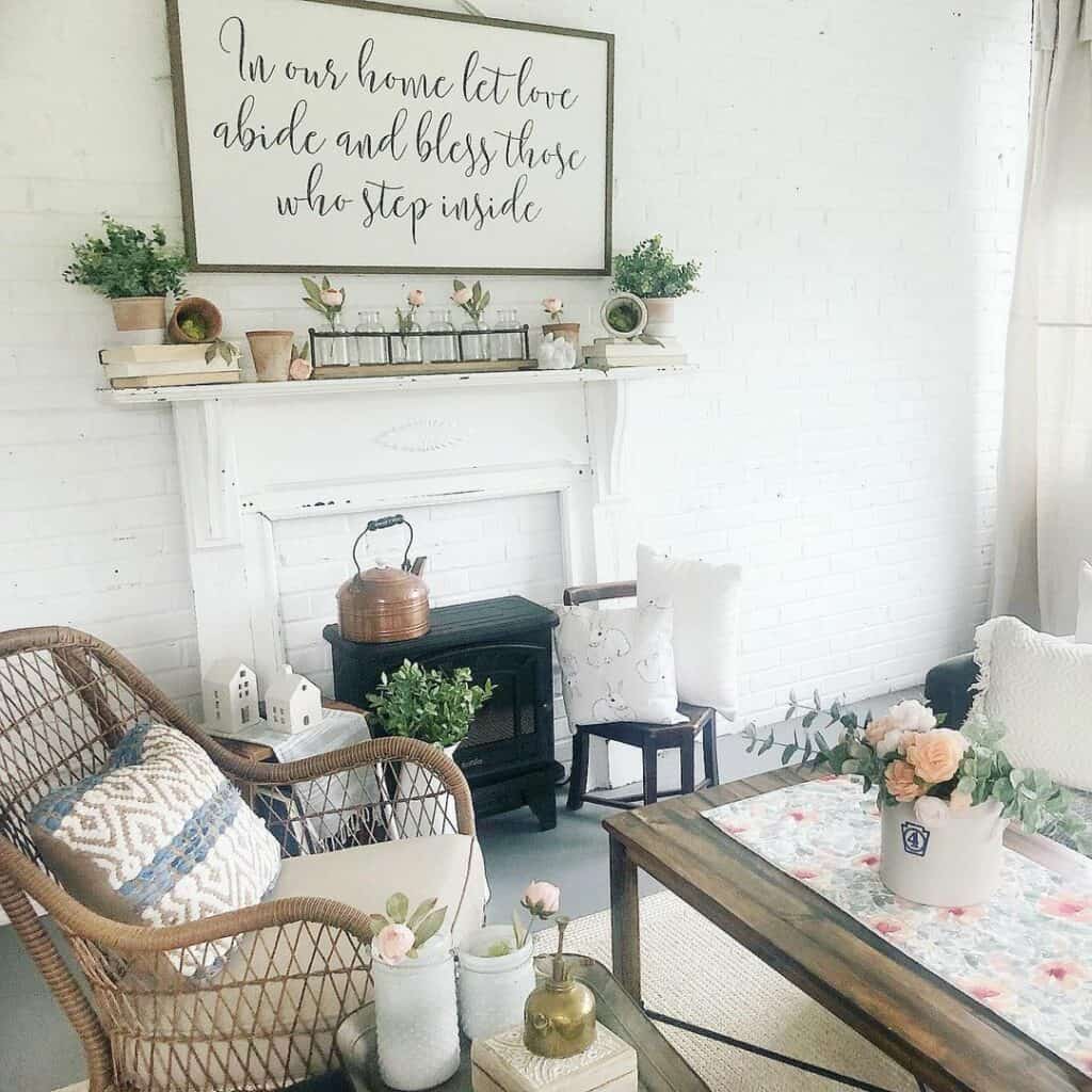 White Faux Fireplace Mantel With Plant Décor