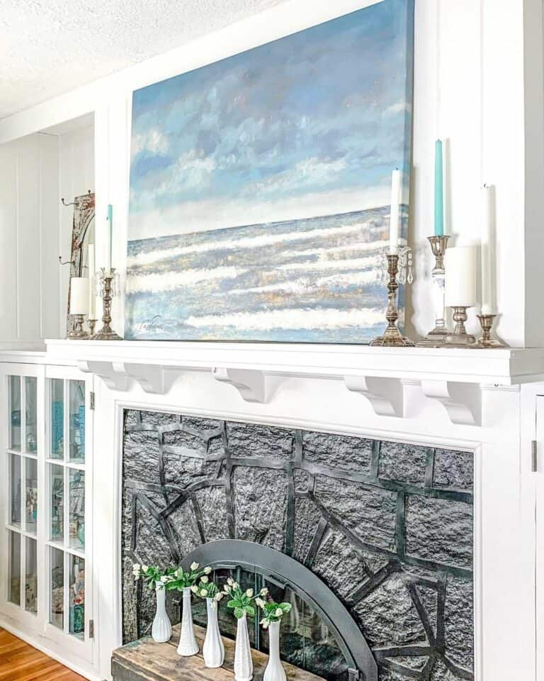White Fireplace Mantel With Blue Accents