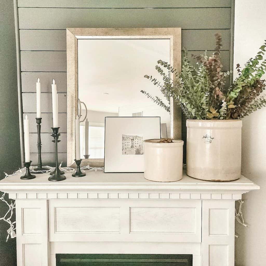 White Fireplace With Beige and Black Mantel Décor