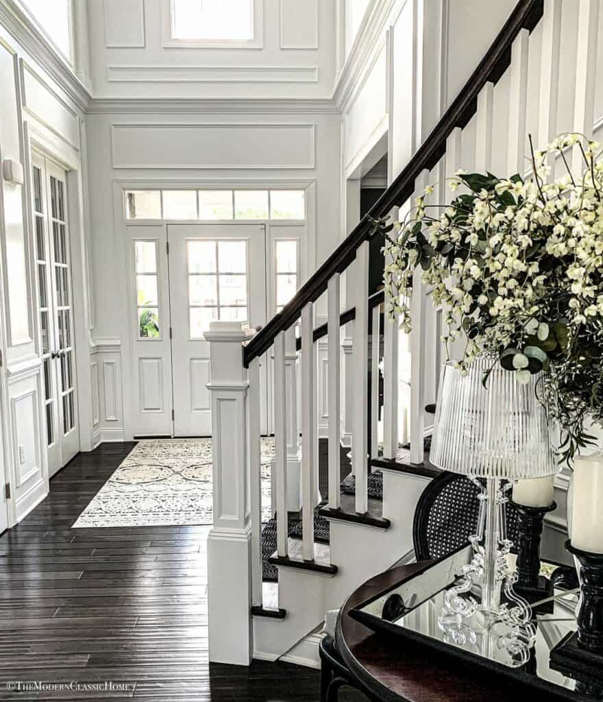 White Foyer Walls With Decorative Molding