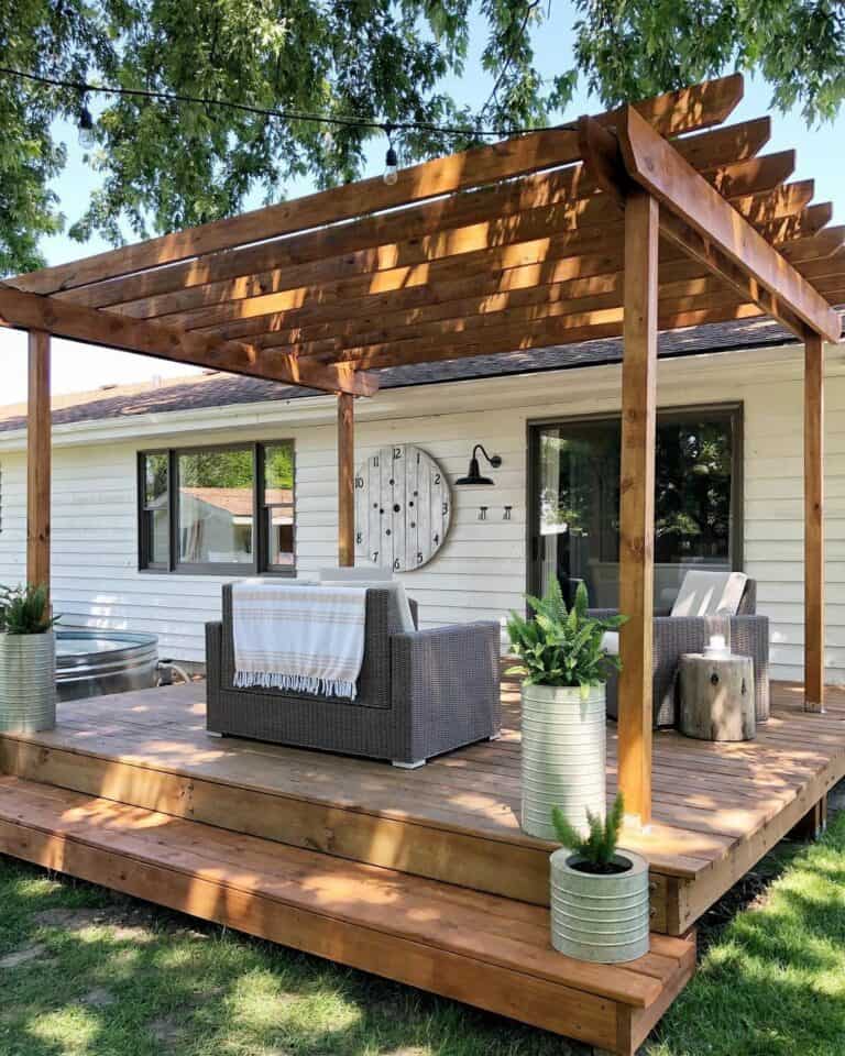 White House With Stained Wood Backyard Pergola
