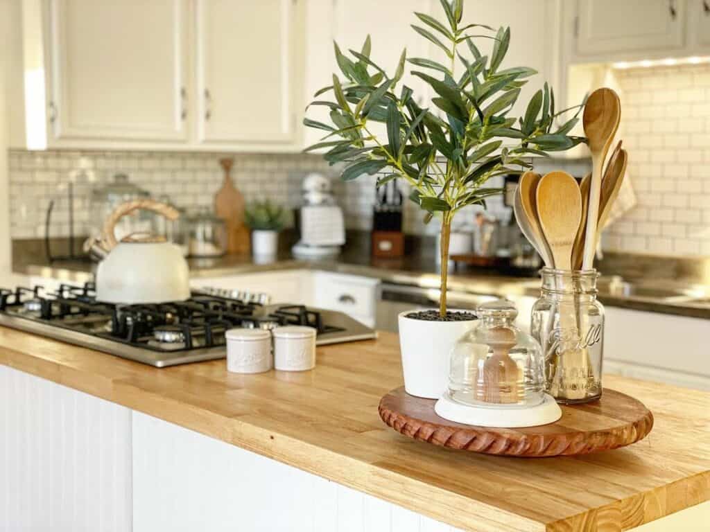 White Kitchen Island With Wooden Countertop Décor