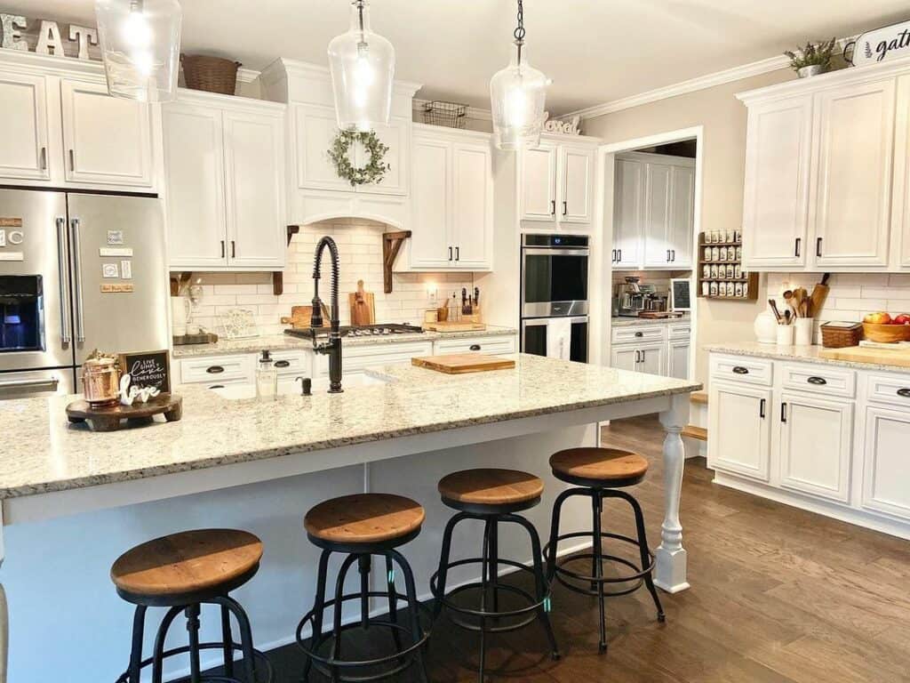 White Kitchen Island With Wooden Stools