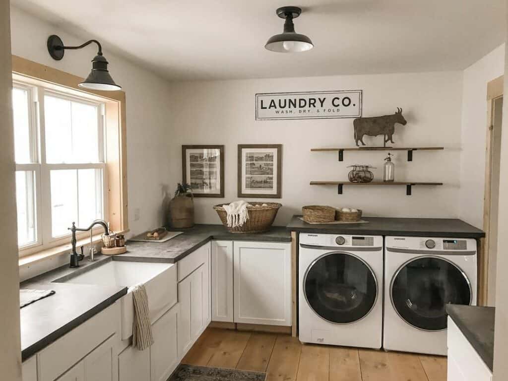White Laundry Cabinets With Dark Gray Countertop