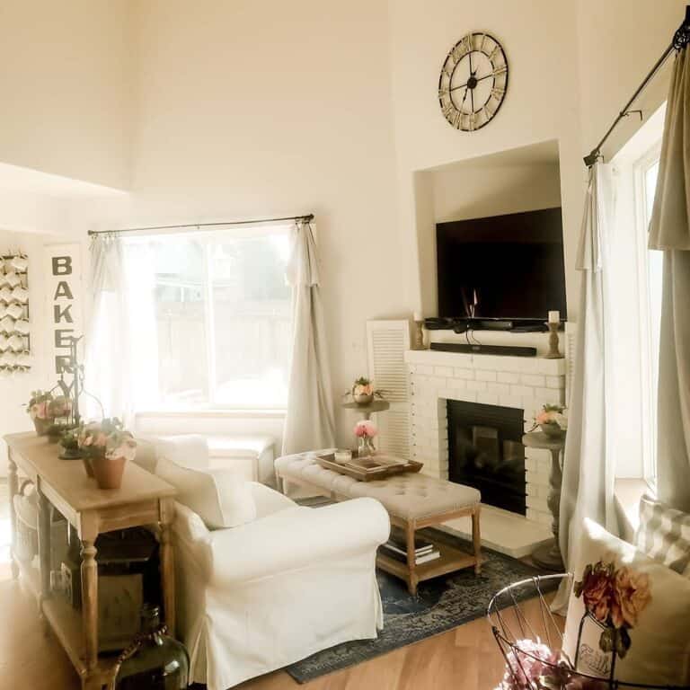 White Living Room With Cute Floral Accents