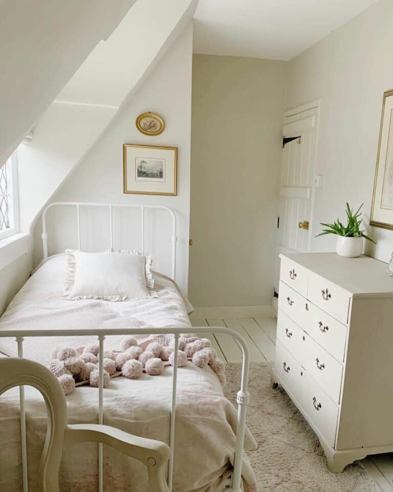 White Metal Bed in Airy Bedroom
