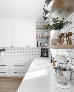 White Quartz Kitchen Countertops and Subway Tile Backsplash