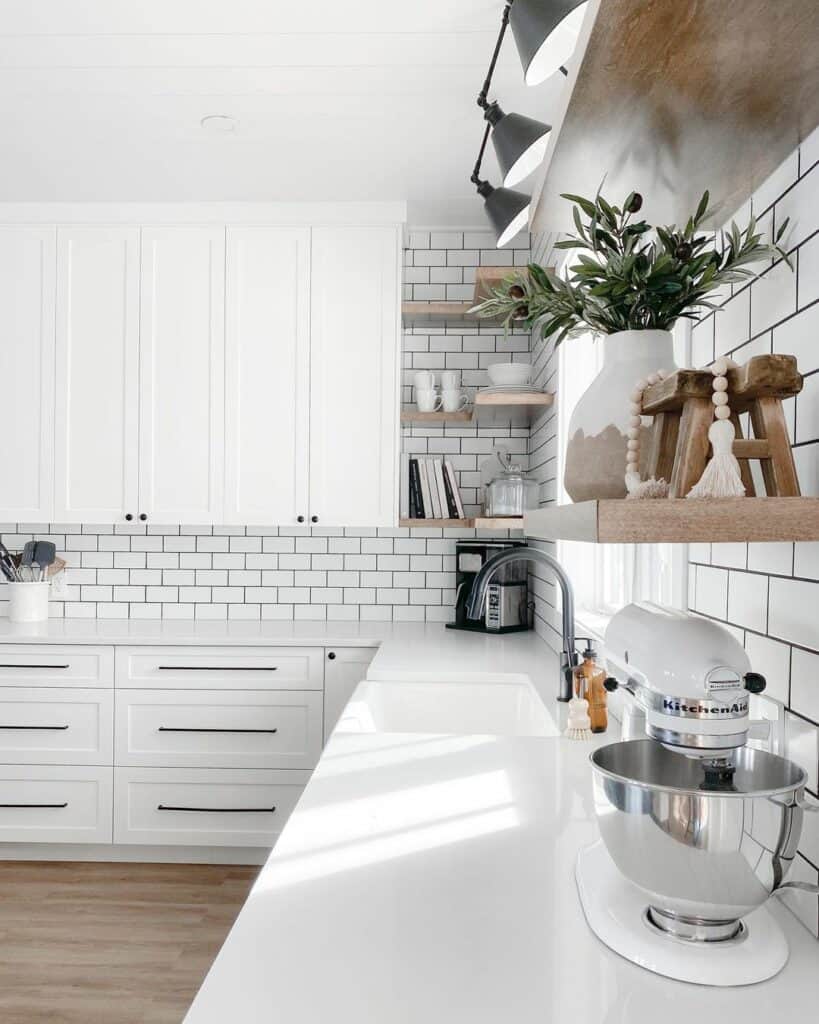 White Quartz Kitchen Countertops and Subway Tile Backsplash