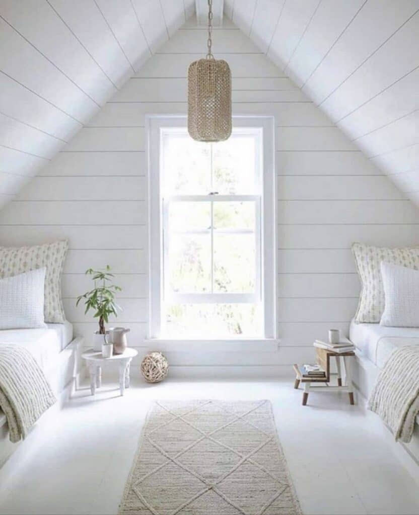White Shiplap Low Sloped Ceiling Bedroom