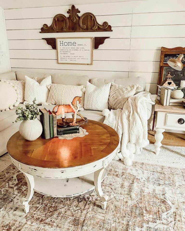 White Shiplap Room With a Wooden Top Table