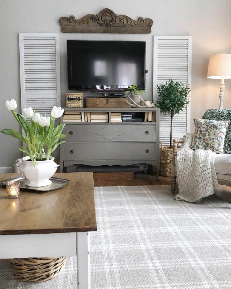 White Shutters Flank an Entertainment Console