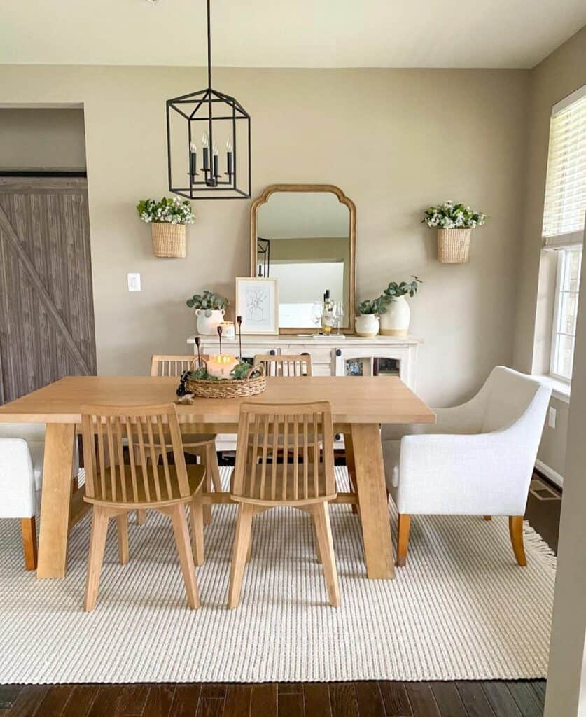 White Sideboard Beside Wooden Dining Table