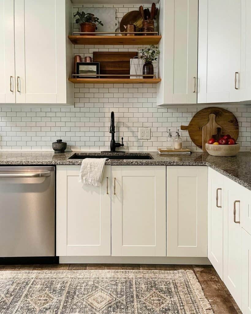 White Subway Tile Backsplash and Gold Hardware