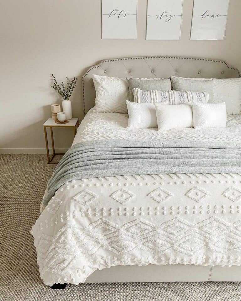 White and Beige Bedroom With Textured Bedding